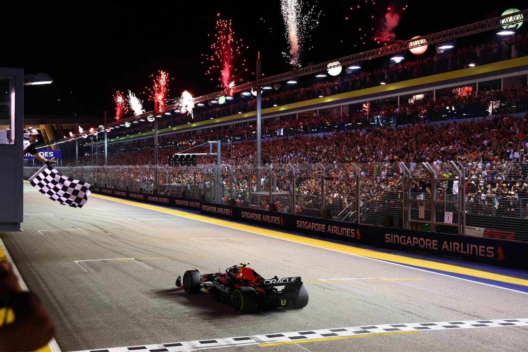 Car crosses the finish line at the Singapore Grand Prix.