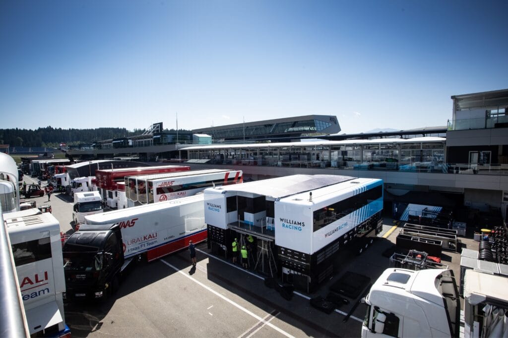Trucks get into position as the paddock take shape