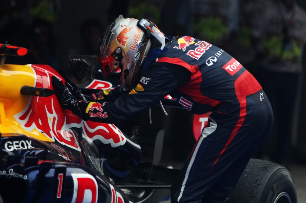Sebastian Vettel celebrates after winning the Indian Grand Prix in the Red Bull Racing RB8