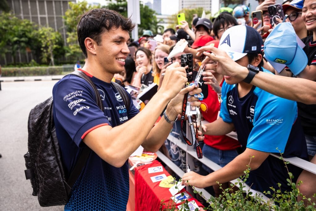 Alex Albon takes time to meet fans and sign autographs at the Singapore Grand Prix