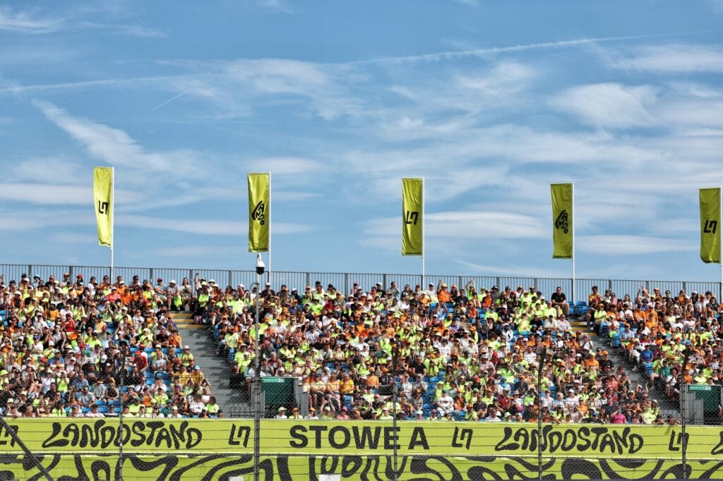 Fans watch from the grandstands at the British Grand Prix at Silverstone 